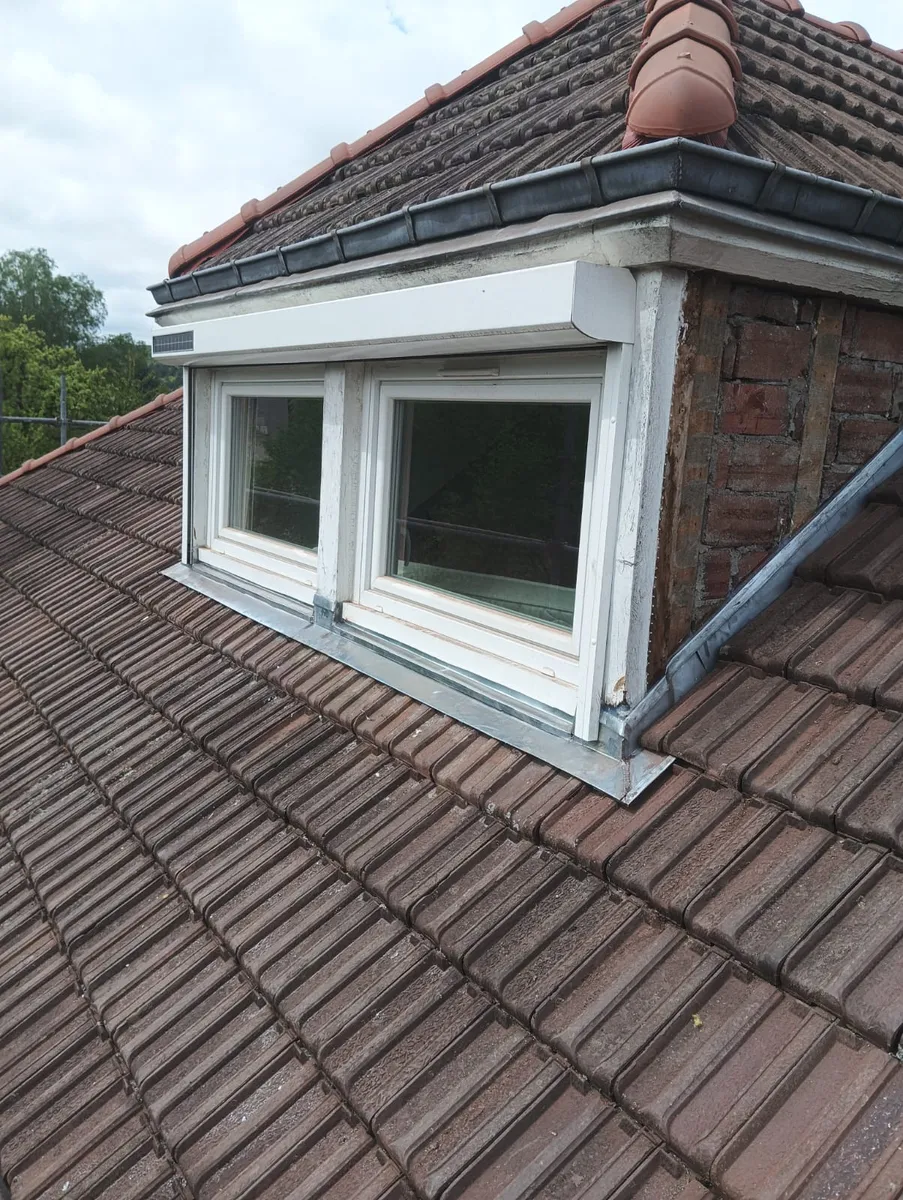 Pose de fenêtre de toit (Velux)